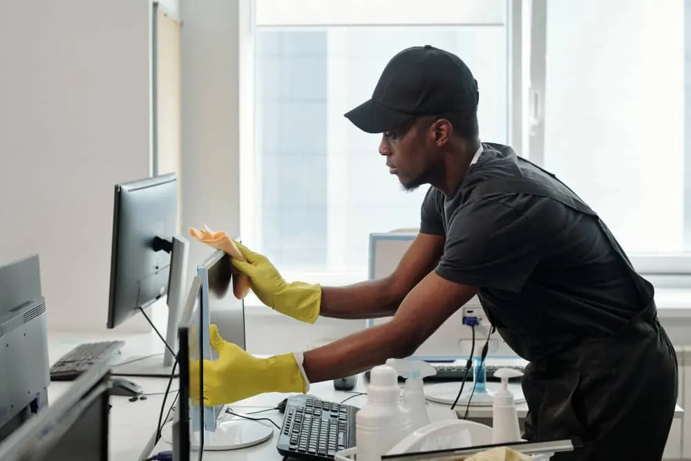 Cleaning a workstation keyboard and monitor